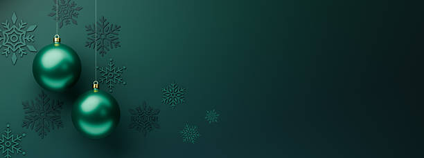 istock A stunning festive backdrop featuring two glossy teal Christmas baubles hanging alongside intricately designed dark green and turquoise paper snowflakes on a deep emerald surface. 2250341910