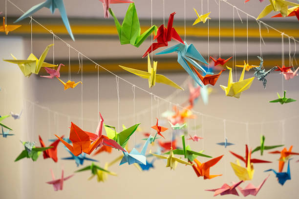 istock Vibrant Hanging Origami Cranes Installation 2250342928