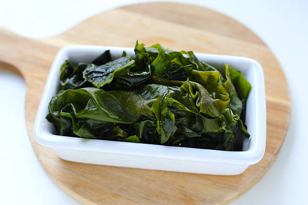 istock Fresh wakame seaweed on white background. 2250346321