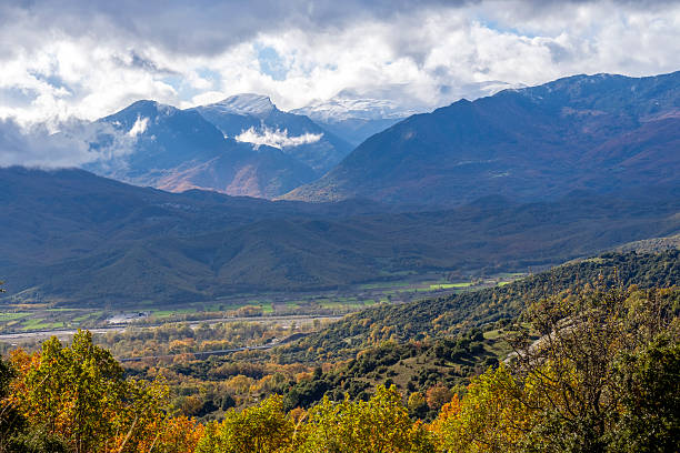 View of the Pirin Mountains and forested parkland from a hiking trail near the touristy town of Bansko in southeastern Bulgaria