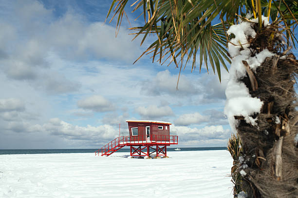 Lifeguard beach house on a beautiful summer day with ocean and blue cloudy sky in Siesta Key Beach, Florida, USA