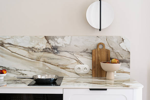 istock Modern kitchen design featuring a sleek marble countertop and utensils 2250364690