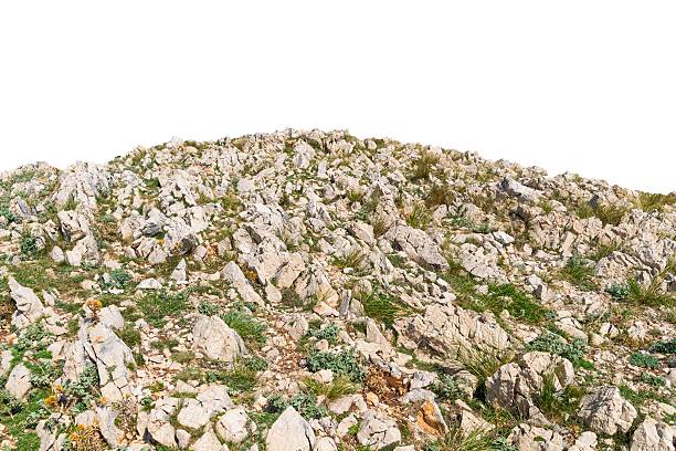 Rocky landscape with greenery on isolated white background.