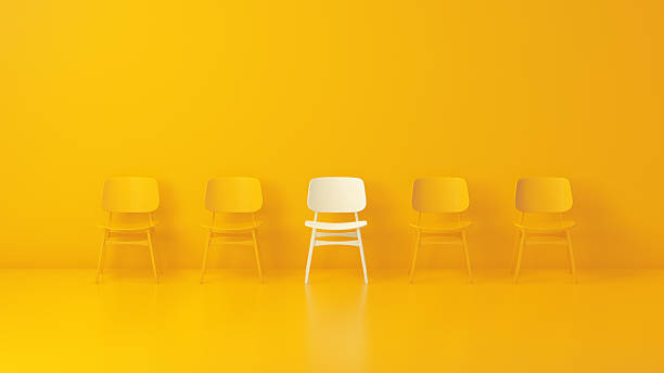 istock 3D Minimalist White Chair Among Yellow Chairs 2250368013