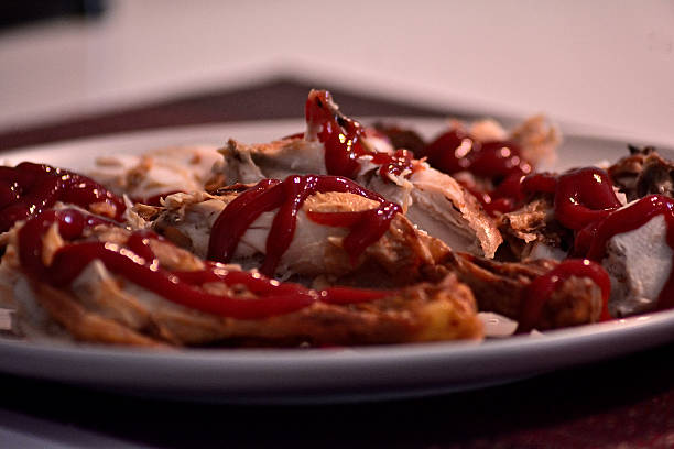 Roast chicken pieces with ketchup sauce