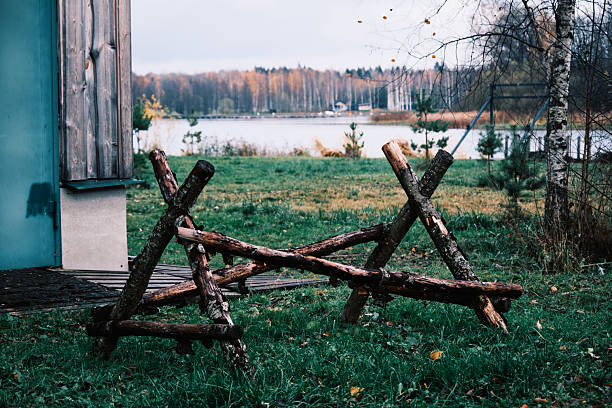 Summer cottage backyard on autumn riverbank