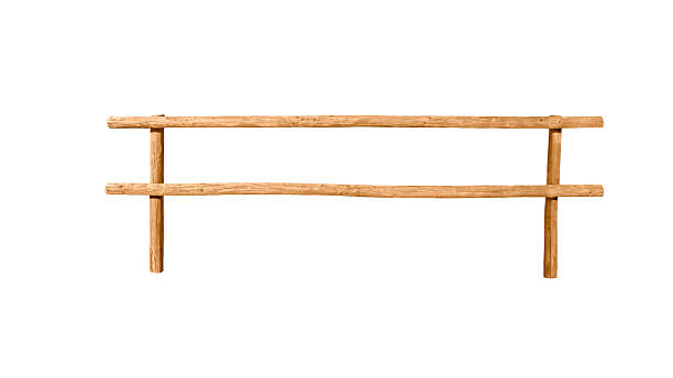 Rustic wooden fence made from natural logs, isolated on white background. Simple handcrafted structure with horizontal beams and vertical supports. Useful as a design element for rural themes, farm concepts, countryside decoration, construction materials, boundaries and outdoor landscapes.