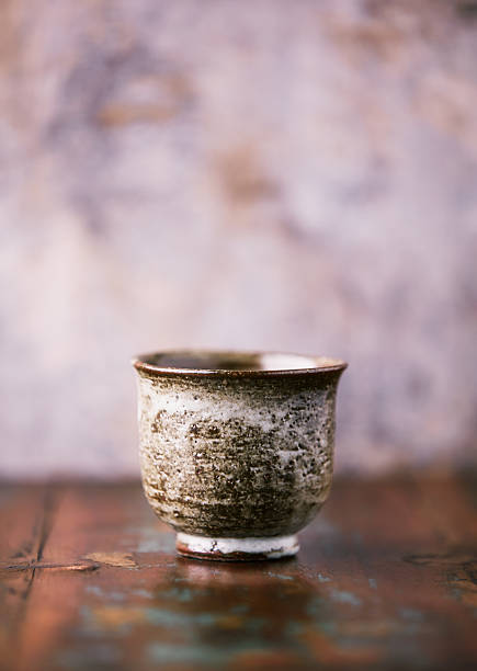 istock Traditional japanese ceramic on rustic wooden background. Soft focus. Copy space. 2250371049