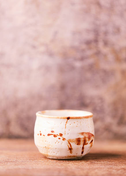 istock Traditional japanese ceramic on rustic wooden background. Soft focus. Copy space. 2250371646