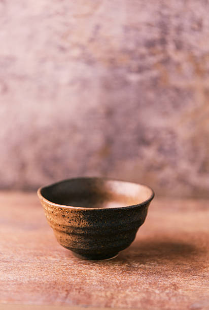 istock Traditional japanese ceramic on rustic wooden background. Soft focus. Copy space. 2250371668