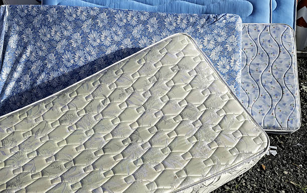 istock Dirty mattresses in the trash 2250372784