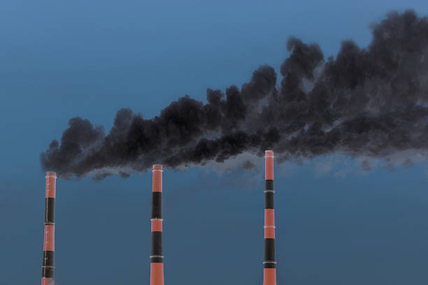 istock Thick black smoke rising from three industrial chimneys against the sky, symbolizing pollution and environmental impact. 2250376570