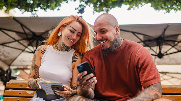 istock Diverse loving couple using phone on Malta 2250380596