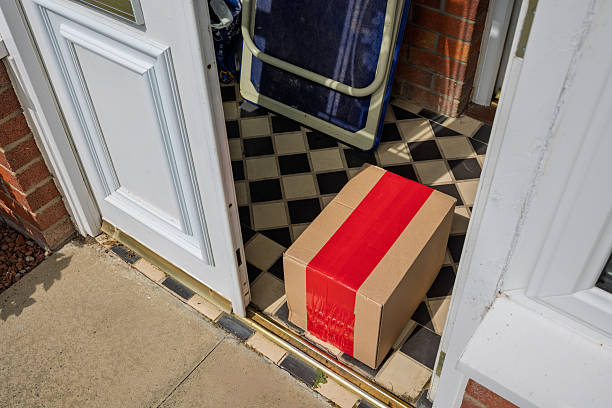 istock Online shopping parcel delivery left inside open porch doorway from outside 2250380742