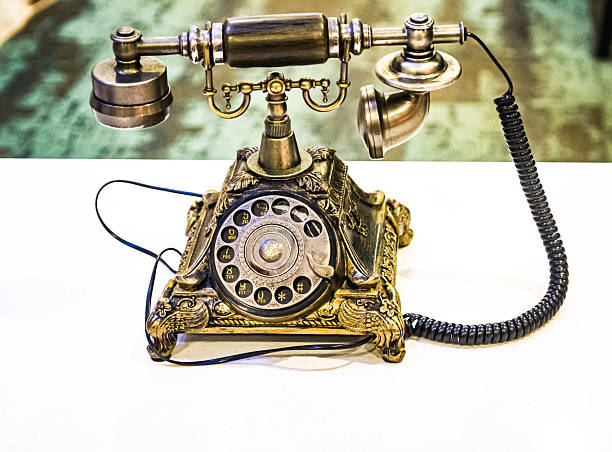 Antique Victorian-Style Rotary Telephone Sitting on Table