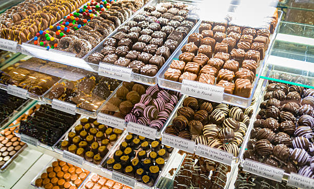 An assortment of home made caramels and truffles in a display case at the Green Dragon farmers market in Ephrata, Pennslyvania
