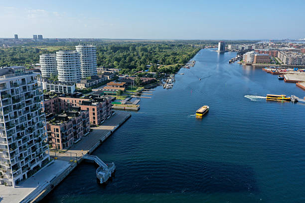 Copenhagen, Denmark August 08,2025:Beautiful Copenhagen City with Harbor and residential buildings. With focus on the residential district Bryggen Syd. Captured during a sunny day in summer season.