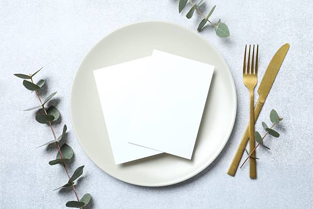 istock Wedding stationery invitation card mockup on grey background with eucalyptus, Menu card mockup with festive wedding or birthday table setting, ceramic plate. Minimal blank card mockup 2250393387