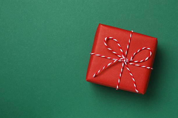 istock Beautiful gift box on color background 2250396036
