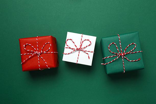 istock Top view of gift boxes on green background 2250396108