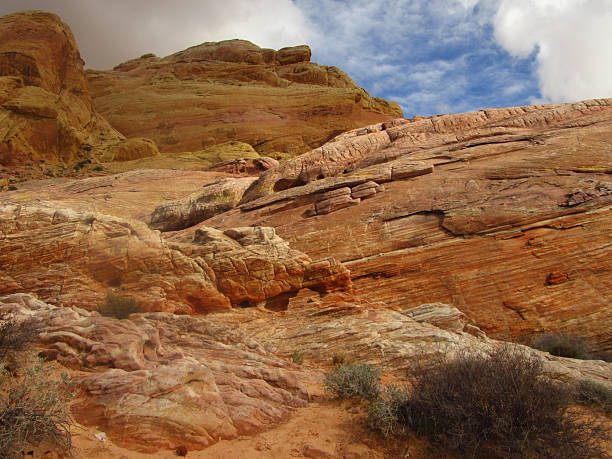 istock Red Rock Formations with Holes in Valley of Fire 2250400562