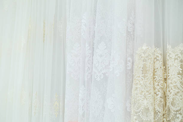 istock Curtains for windows, tulle with mesh texture in the apartment 2250401352