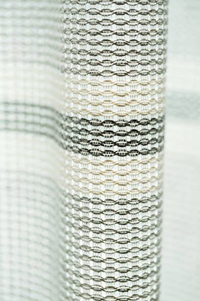 istock Curtains for windows, tulle with mesh texture in the apartment 2250402083