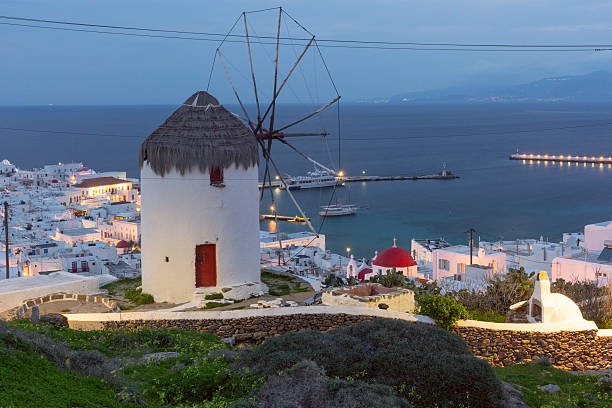 istock Windmill at dusk in Mykonos, Greece 2250409450