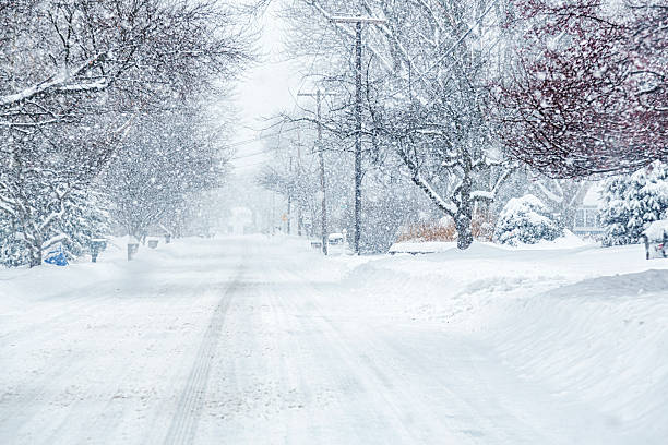 istock Rural Highway During Blinding Blizzard Snow Storm 2250411768
