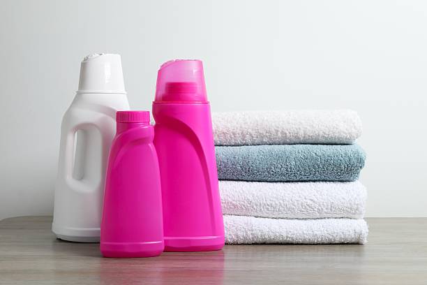 istock A stack of freshly washed towels and washing products on a table 2250412930