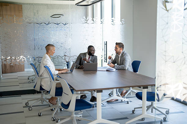 istock Business team discussing during a meeting in a modern office 2250419928
