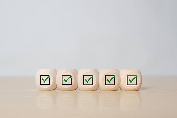 istock Checklist, Task list, Survey and assessment. Quality Control. Goal achievement and business success. Elections and Voting, Vote, to do list. Check mark icon on wooden blocks 2250422751