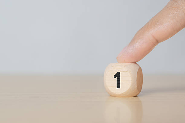istock Number 1 On A Wooden Block On A Table 2250422783