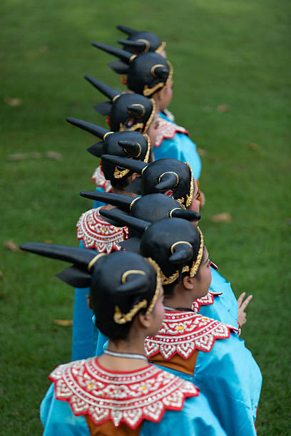 Phimai, Nakhon Ratchasima, Thailand - 2025/08/11: Traditional Thai dance performance during the 2025 Phimai Festival in Nakhon Ratchasima. Dressed as young water buffalo.