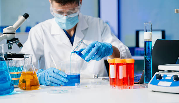 istock Scientists, beakers, and microscopes in cutting-edge research. Perfect for science and technology projects. 2250439465