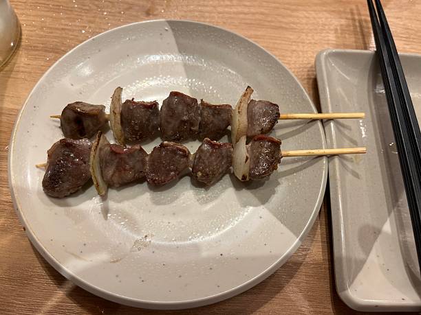 istock chicken gizzard skewers for dinner 2250451062