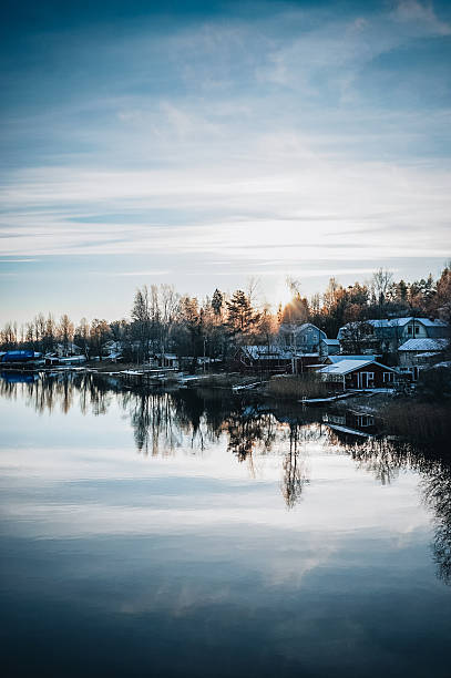 istock Small idyllic village by lake 2250456615