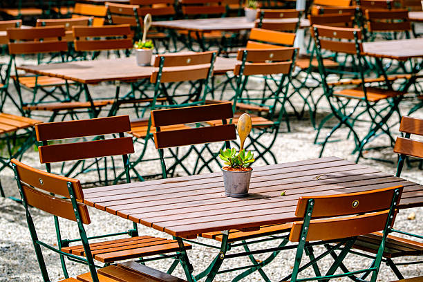 istock wooden benches and tables at a typical bavarian beergarden 2250469802