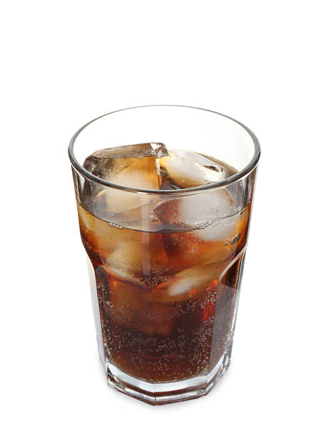 istock Refreshing cola with ice cubes in glass isolated on white 2250470803