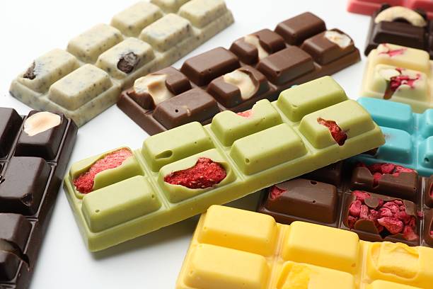istock Different tasty chocolate bars on white background, closeup 2250471717