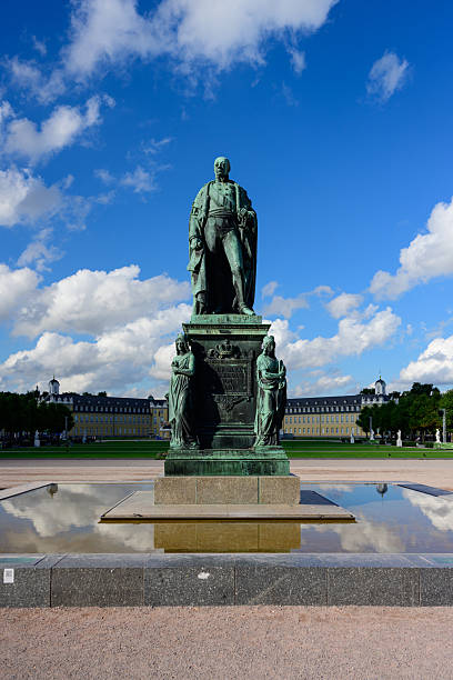 Karlsruhe, Germany - Septermber 16, 2012: Monument to Karl Friedrich von Baden (Charles Frederick, Grand Duke of Baden) in front of the Karlsruhe Palace in night. The monument by the Geman sculptor Ludwig Schwanthaler was unveiled on November 22, 1844.