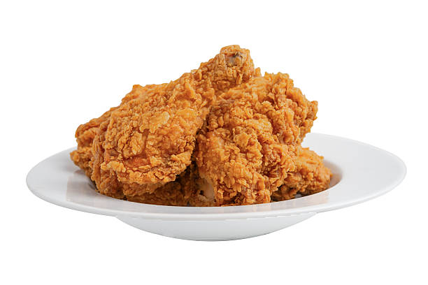 istock Fried chicken drumstick pieces on white plate isolated on whte background with clipping path. 2250487327
