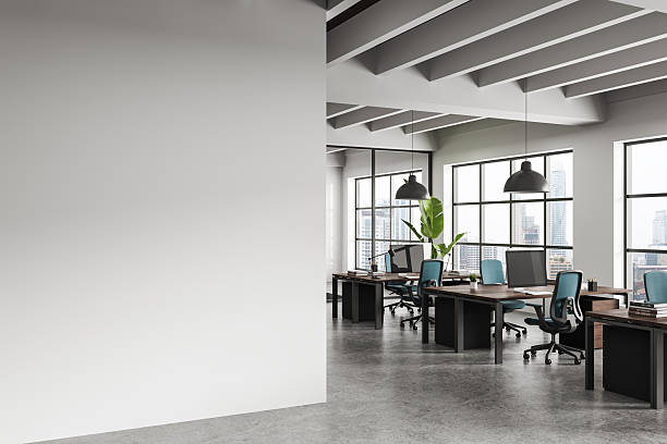 Contemporary office interior with clean empty wall for poster mockup, realistic style, modern workspace background, concept of creative presentation layout. 3D Rendering