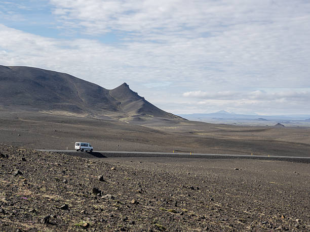 istock motorway in lava fields of Iceland 2250497575