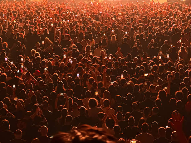 istock Concert crowd in front of a live stage 2250497766
