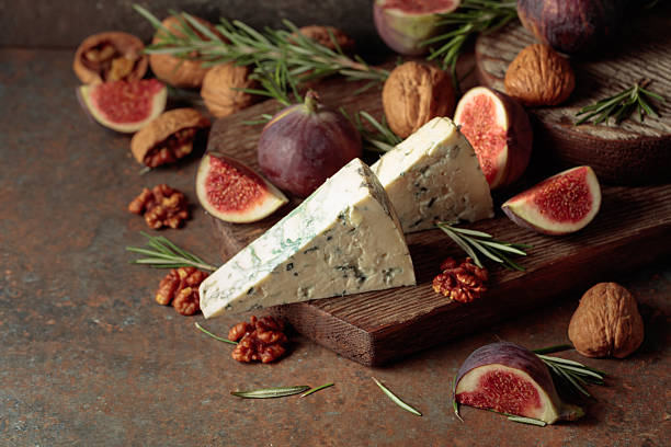 istock Blue cheese with fresh figs, rosemary, and walnuts. 2250498075