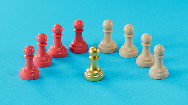 istock Golden Pawn Between Beige and Red Groups: Symbolizing Prominence 2250498616