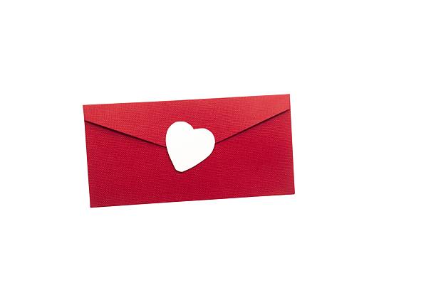 Red envelope with white heart decoration, open, isolated on white background, romantic and festive