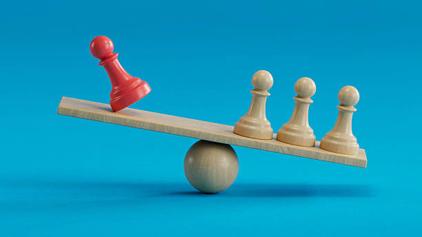 istock Red Pawn vs Three Beige: Representing Proportional Influence 2250498650