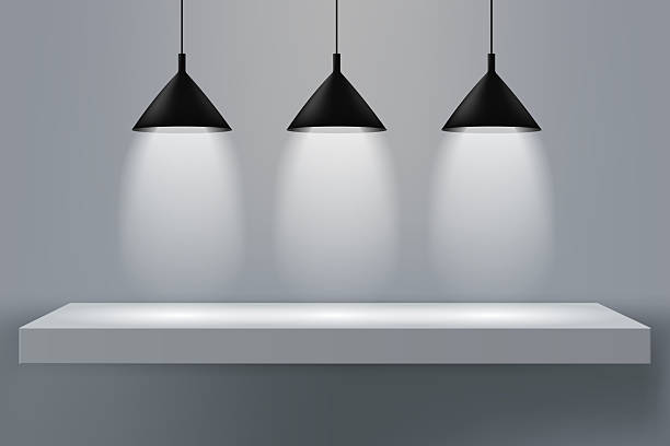 istock Modern hanging chandelier for lighting above the demonstration area. 2250500573